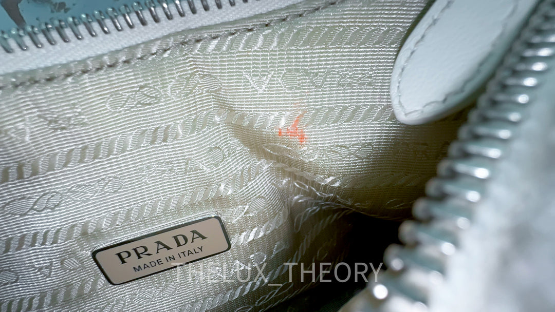 PRADA RE-EDITION 2000 SHEARLING SHOULDER BAG WHITE 2021
