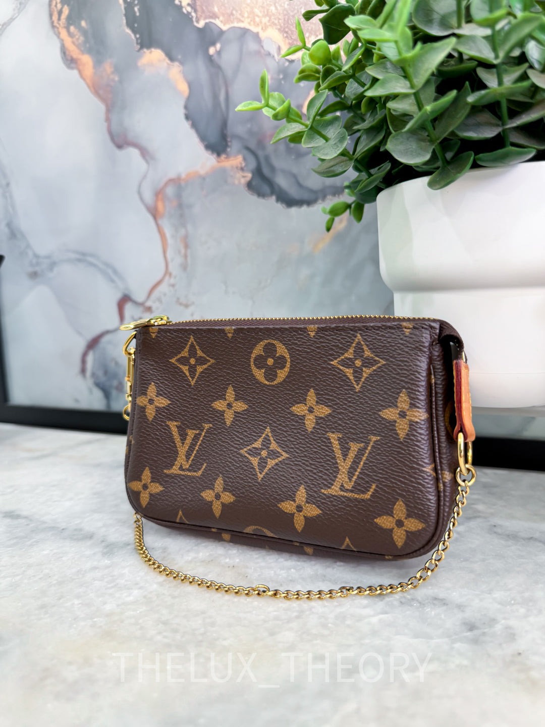L.V. MINI POCHETTE MONOGRAM 2021