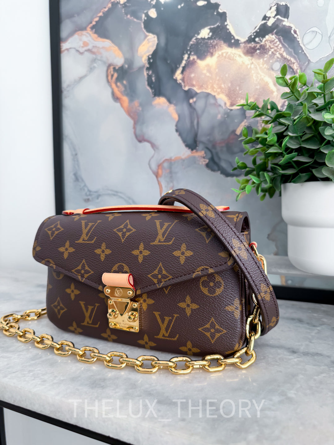 POCHETTE METIS EAST WEST MNG 2022
