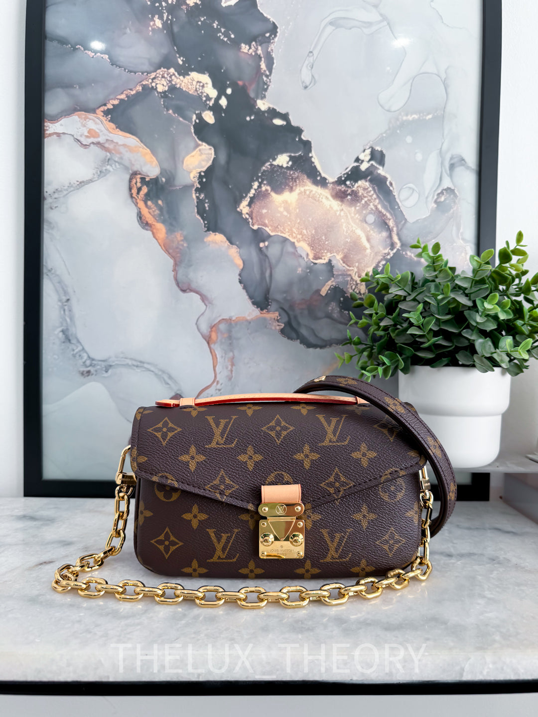 POCHETTE METIS EAST WEST MNG 2022