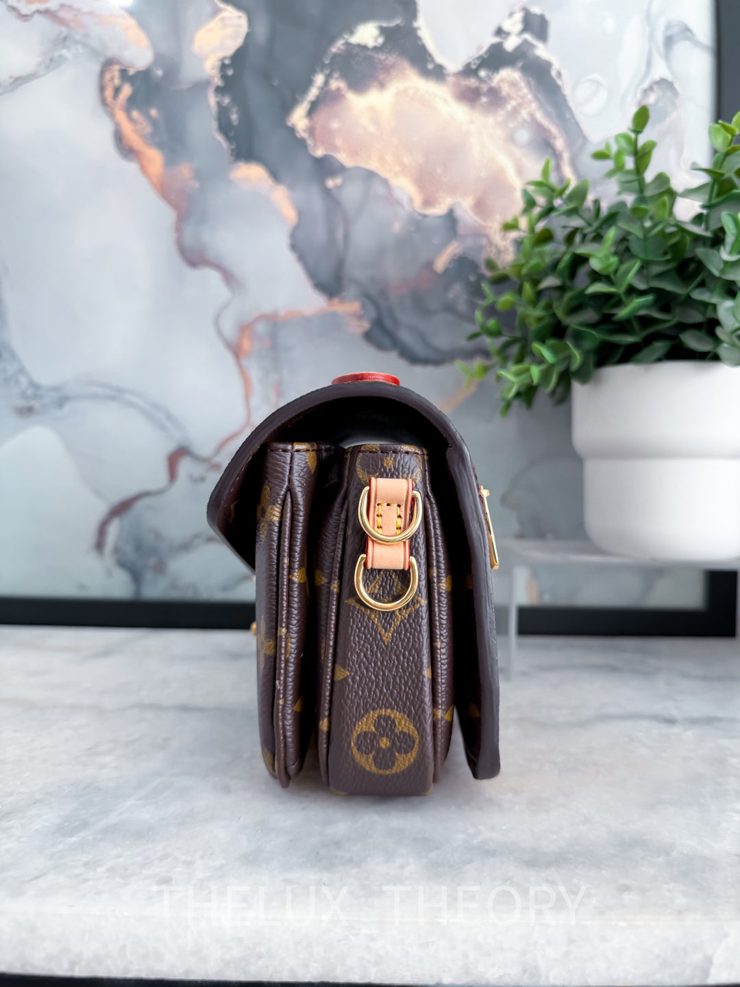 POCHETTE METIS EAST WEST MNG 2022