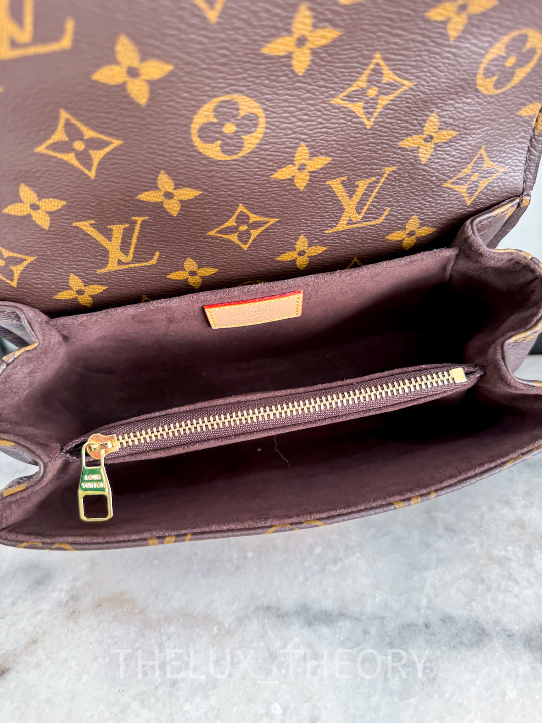 POCHETTE METIS EAST WEST MNG 2022