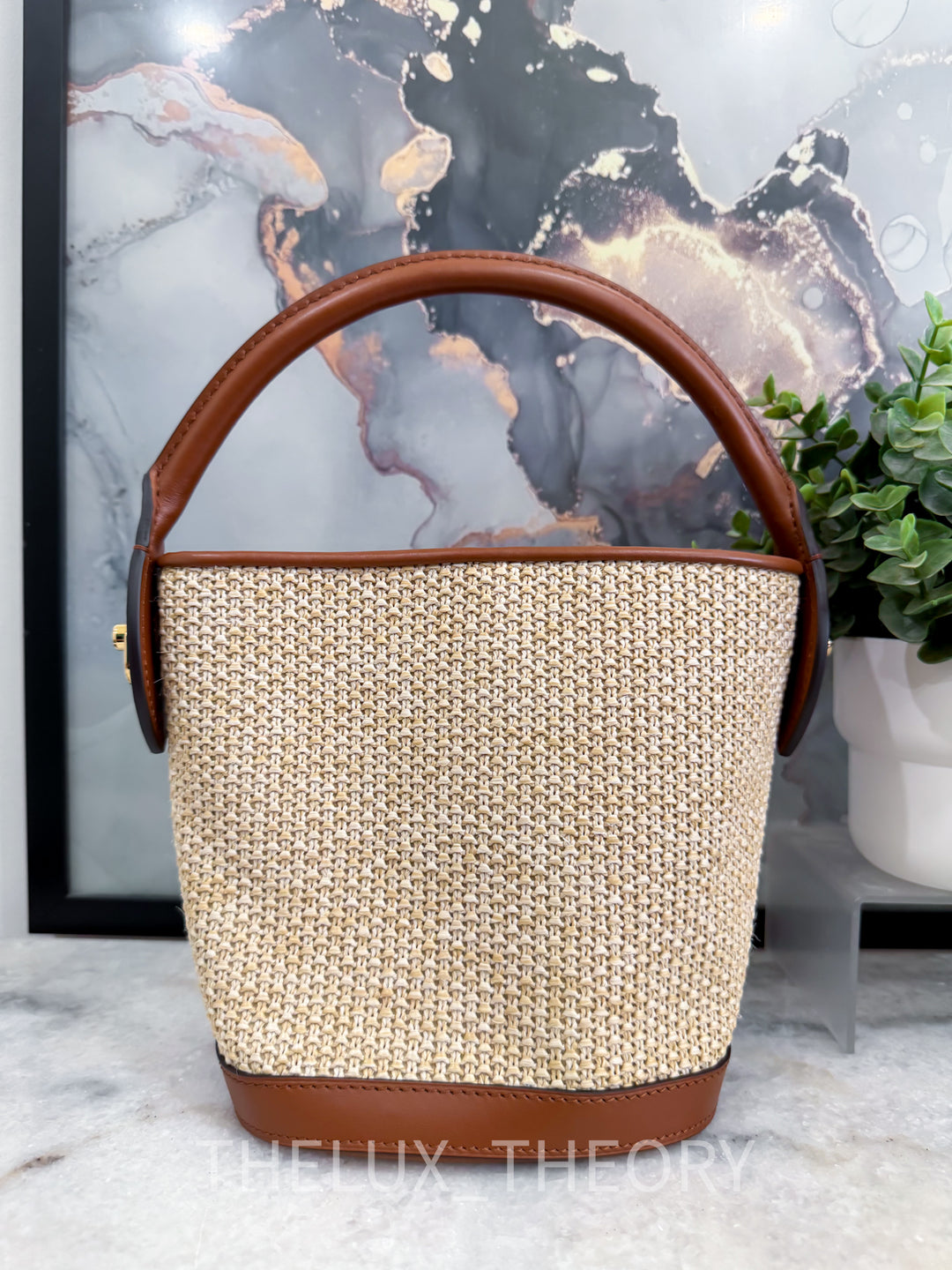 L.V. PETITE RAFFIA BUCKET BAG
